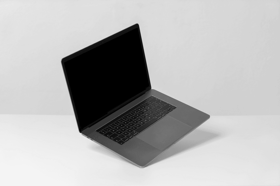 An elegant MacBook setup showcasing a professional application interface